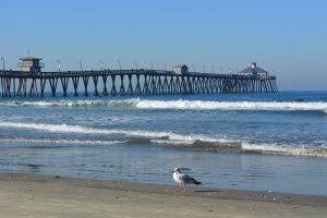 Medium tide at the Imperial Beach Pier. A coastal location makes the Imperial Beach real estate market one to watch.